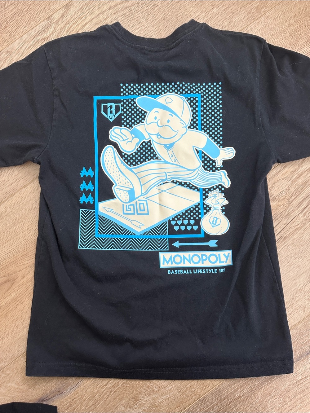 Baseball Lifestyle 101 YL Black Graphic Tee with Teal Monopoly Logo - Picture 4 of 4